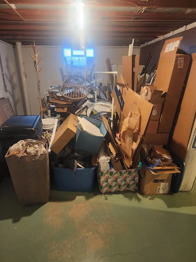 Roll-off dumpster container at job site for 4 Yard Dumpster Rental in Rawlins